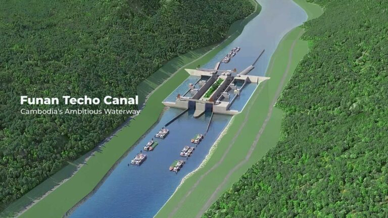 Aerial view of the Funan Techo Canal under construction, connecting the Mekong River to the sea, with cargo ships and developing industrial zones.