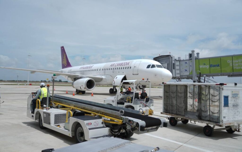 Cargo aircraft at Techo International Airport's dedicated air freight terminal, with cold storage facilities in background.